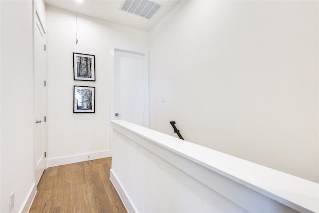 hallway featuring light hardwood / wood-style floors