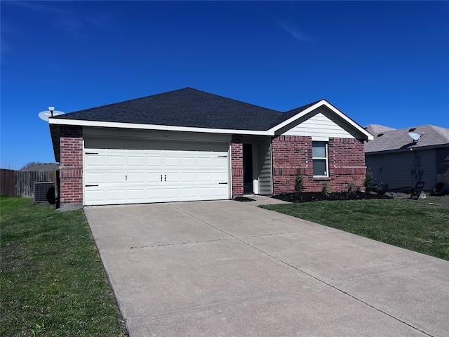 single story home featuring a front yard and a garage