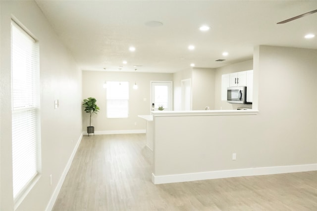 interior space with light hardwood / wood-style floors