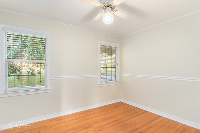 unfurnished room with crown molding, ceiling fan, and hardwood / wood-style flooring