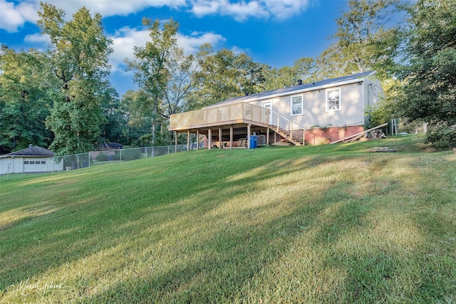 view of yard featuring a wooden deck