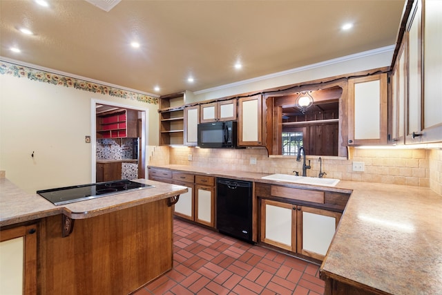 kitchen featuring black appliances, crown molding, sink, and tasteful backsplash