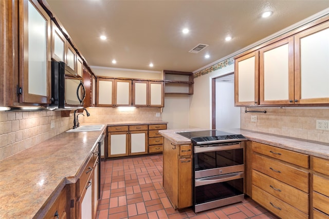 kitchen with stainless steel appliances, crown molding, sink, and decorative backsplash