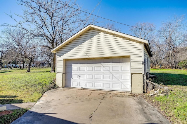 garage with a lawn