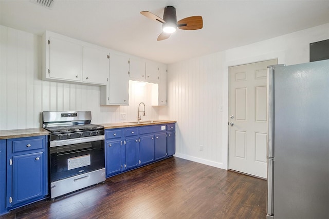 kitchen featuring white cabinets, stainless steel appliances, blue cabinets, and sink