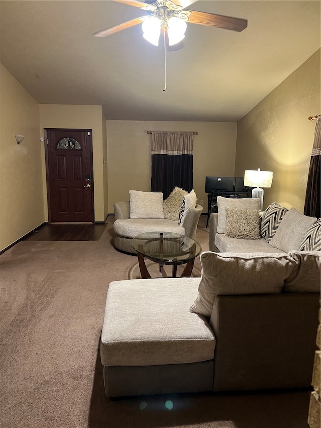 living room featuring carpet flooring and ceiling fan