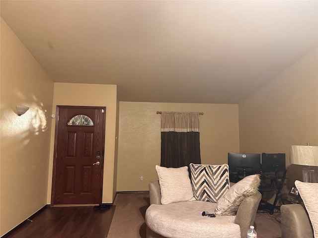 foyer with dark hardwood / wood-style floors