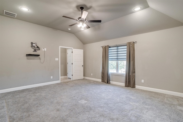 unfurnished bedroom with carpet, lofted ceiling, and ceiling fan