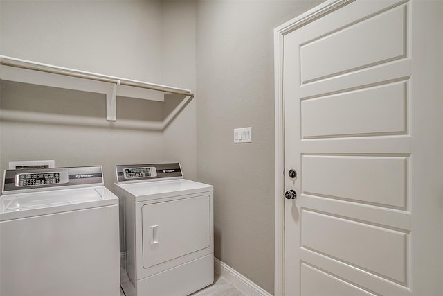 laundry room with washer and dryer