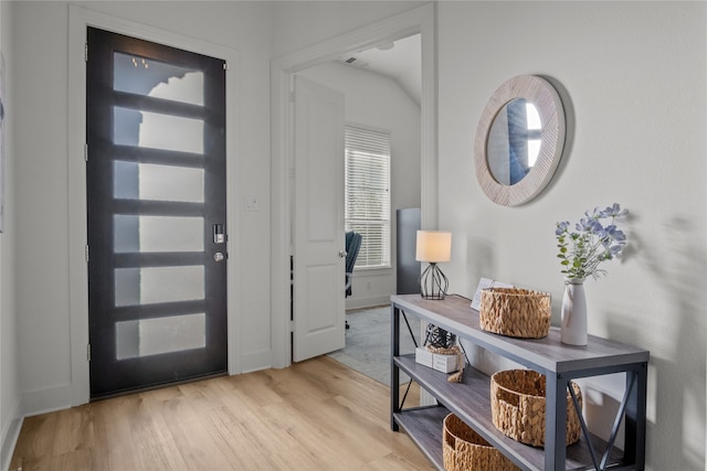 foyer with light wood-type flooring