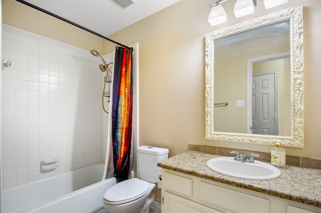 full bathroom featuring shower / tub combo with curtain, vanity, and toilet