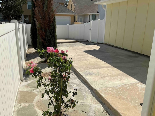 view of patio / terrace with a garage