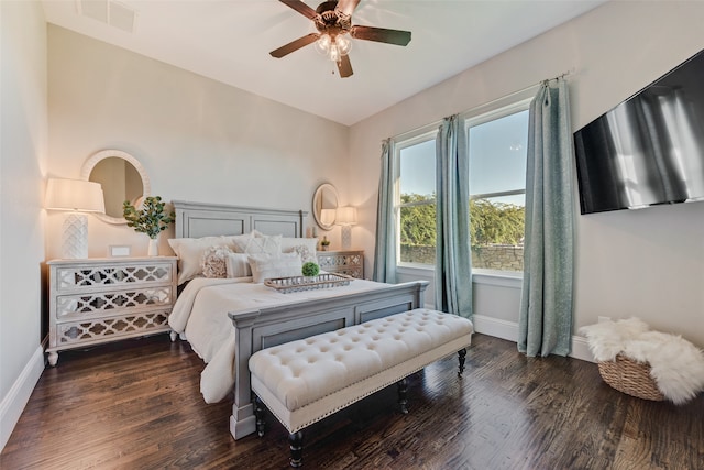 bedroom with dark wood-type flooring and ceiling fan