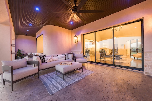 cinema room with ceiling fan and wood ceiling