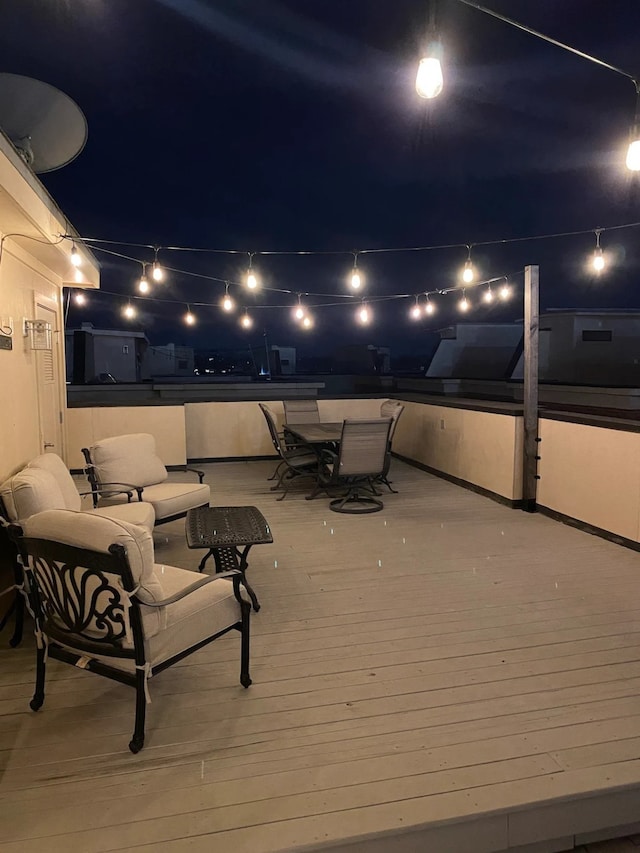 view of deck at twilight