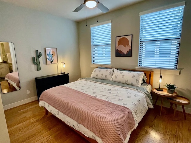 bedroom featuring wood-type flooring and ceiling fan