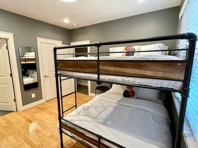 bedroom with light wood-type flooring