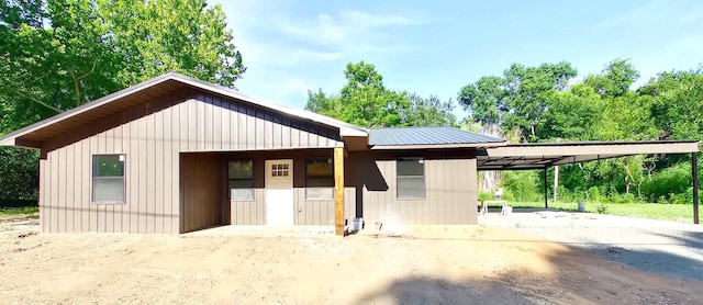 exterior space featuring a carport