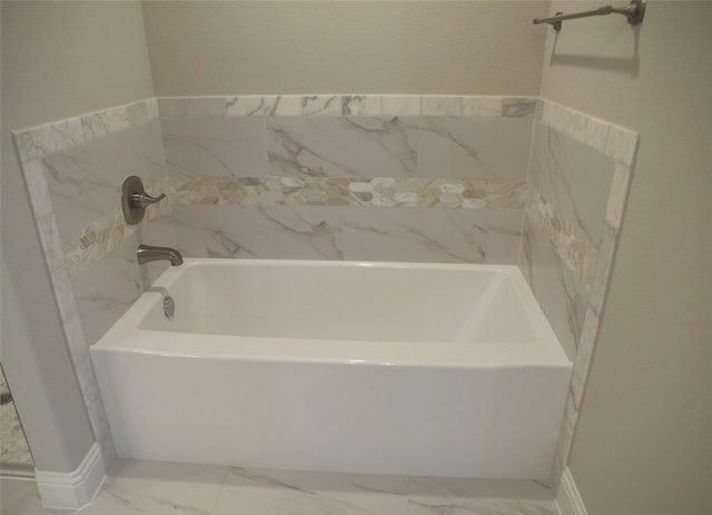 bathroom with a washtub