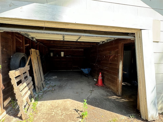 garage with wood walls