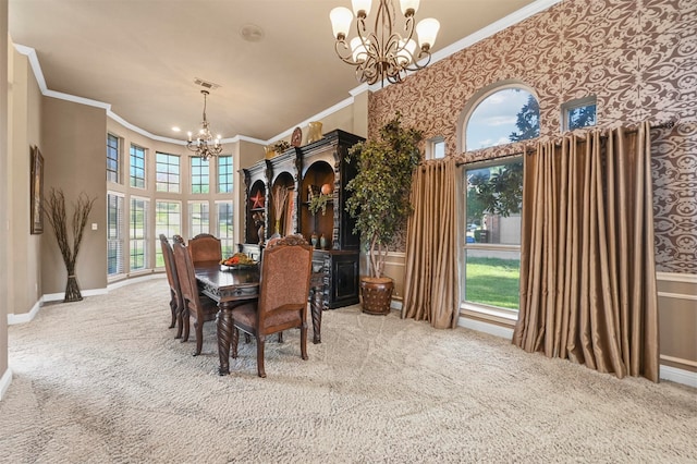 unfurnished dining area featuring ornamental molding, a chandelier, and a healthy amount of sunlight