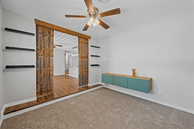 unfurnished bedroom featuring hardwood / wood-style flooring and ceiling fan