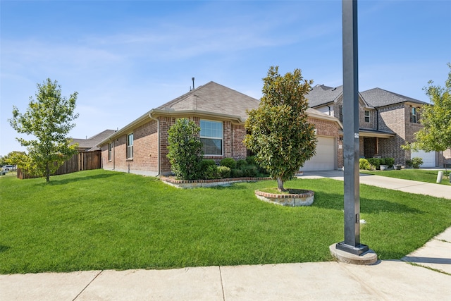 ranch-style home with a front lawn and a garage