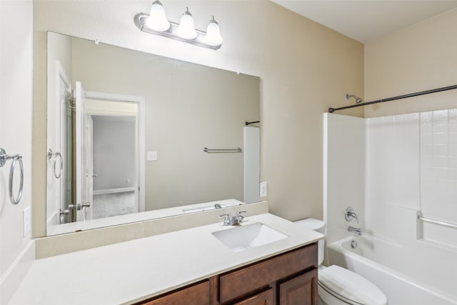 full bathroom featuring  shower combination, vanity, and toilet