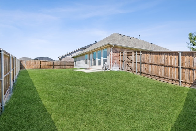 view of yard with a patio area