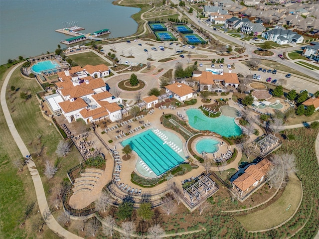 bird's eye view with a water view