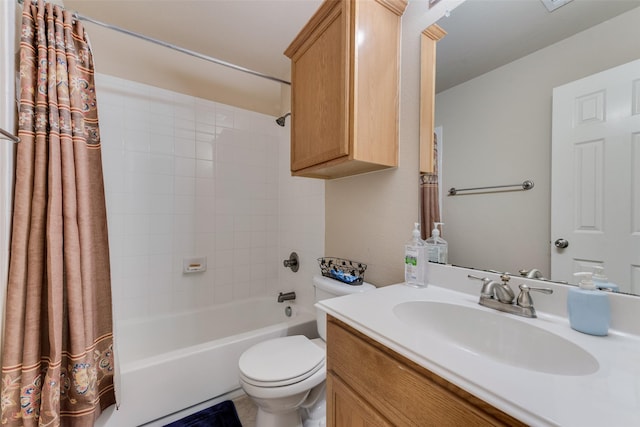 full bathroom featuring shower / bath combination with curtain, vanity, and toilet