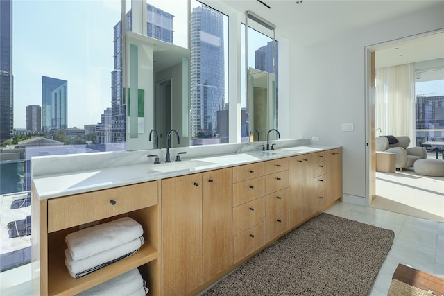 bathroom featuring vanity and tile patterned flooring