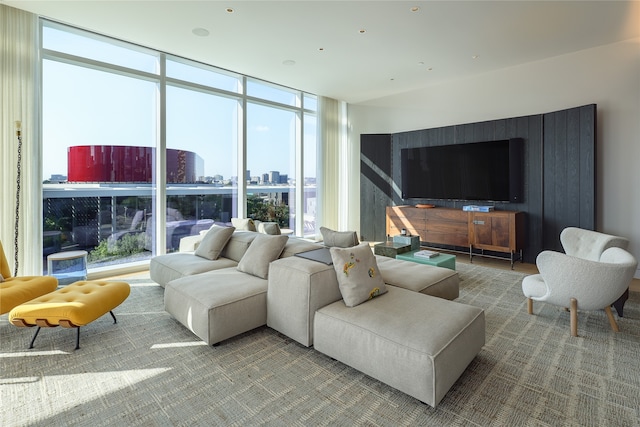 living room with expansive windows and a wealth of natural light