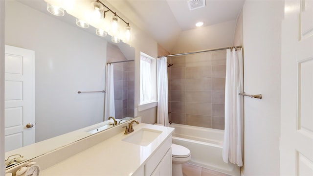 full bathroom featuring tile patterned flooring, vanity, shower / tub combo, and toilet