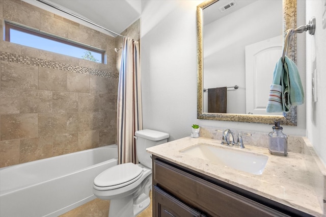 full bathroom with toilet, vanity, and shower / tub combo