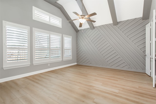 unfurnished room featuring high vaulted ceiling, light wood-type flooring, and ceiling fan