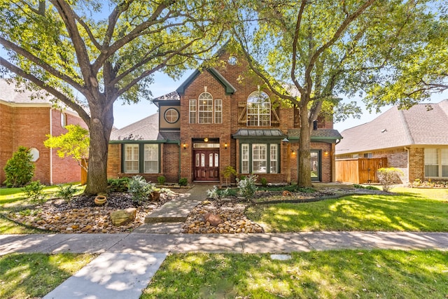 view of front of home with a front lawn