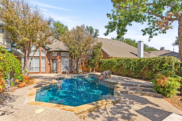 view of pool featuring a patio