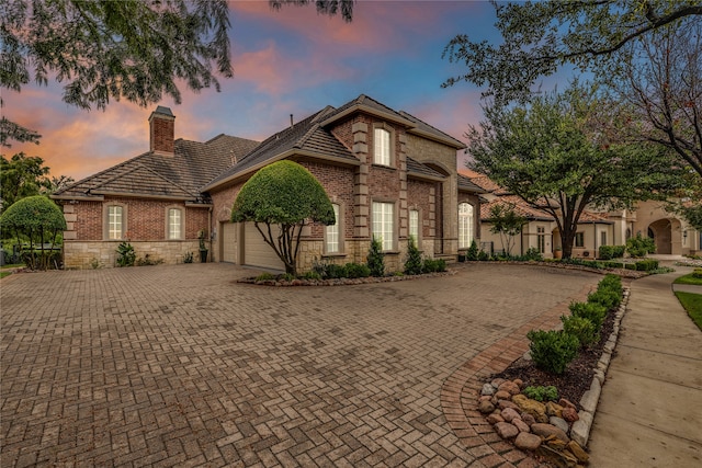 view of front of property with a garage