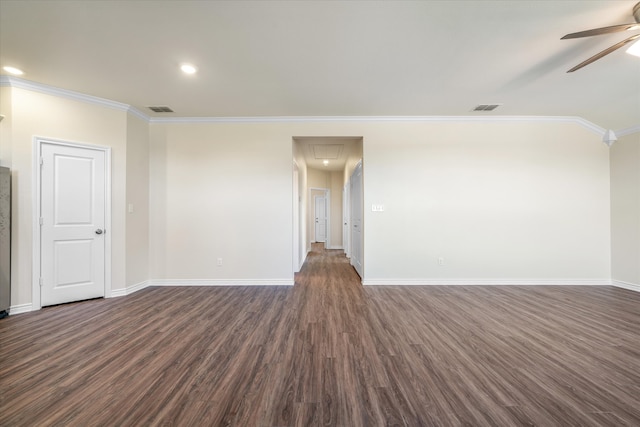 unfurnished room featuring crown molding, ceiling fan, and dark hardwood / wood-style floors