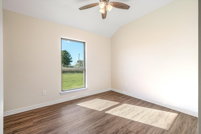 unfurnished room with hardwood / wood-style floors, ceiling fan, and lofted ceiling