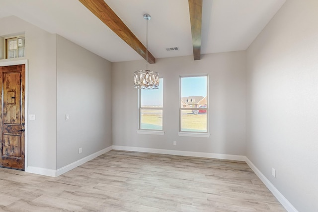 unfurnished dining area with beamed ceiling, an inviting chandelier, and light hardwood / wood-style flooring