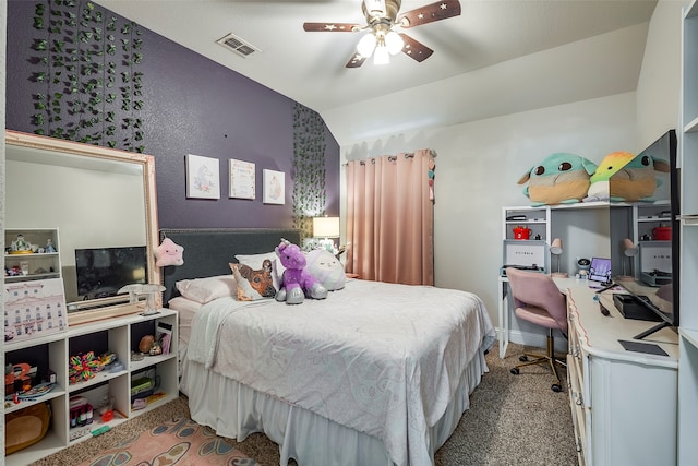 bedroom featuring vaulted ceiling, ceiling fan, and carpet flooring