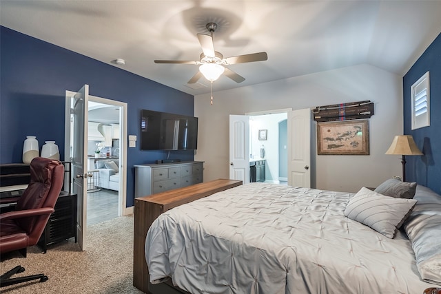 carpeted bedroom featuring vaulted ceiling and ceiling fan