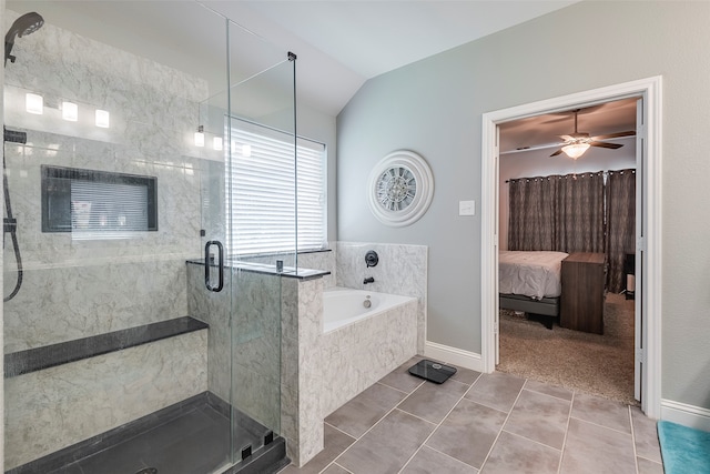 bathroom featuring ceiling fan, separate shower and tub, tile patterned flooring, and vaulted ceiling