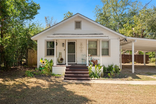 bungalow featuring a front yard