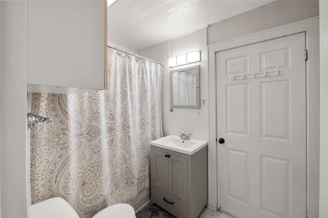 505 S Boyd, Lindale, TX 75771 - full bath featuring toilet, vanity, and a shower with shower curtain