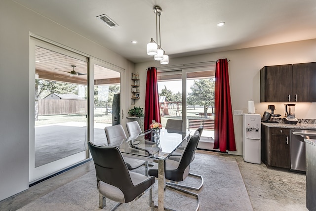 dining area with ceiling fan