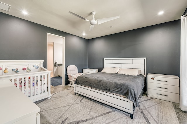 carpeted bedroom with ceiling fan