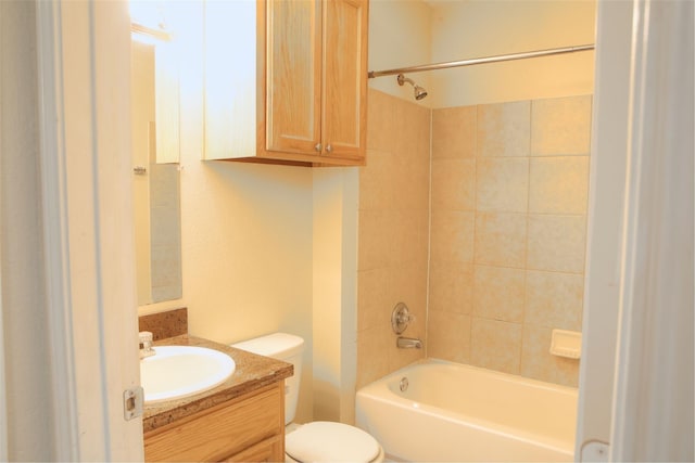 full bath with toilet, vanity, and shower / tub combination